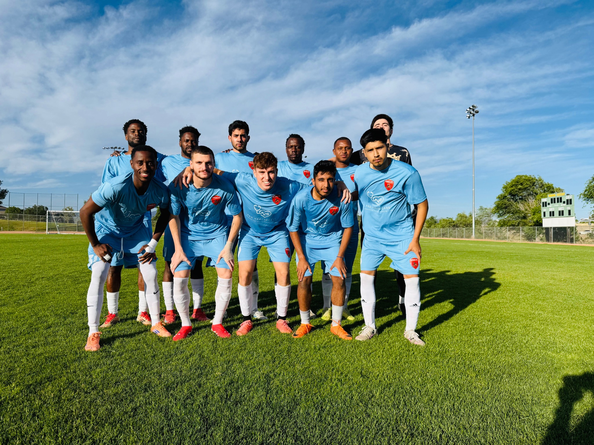 Kings FC team in blue.